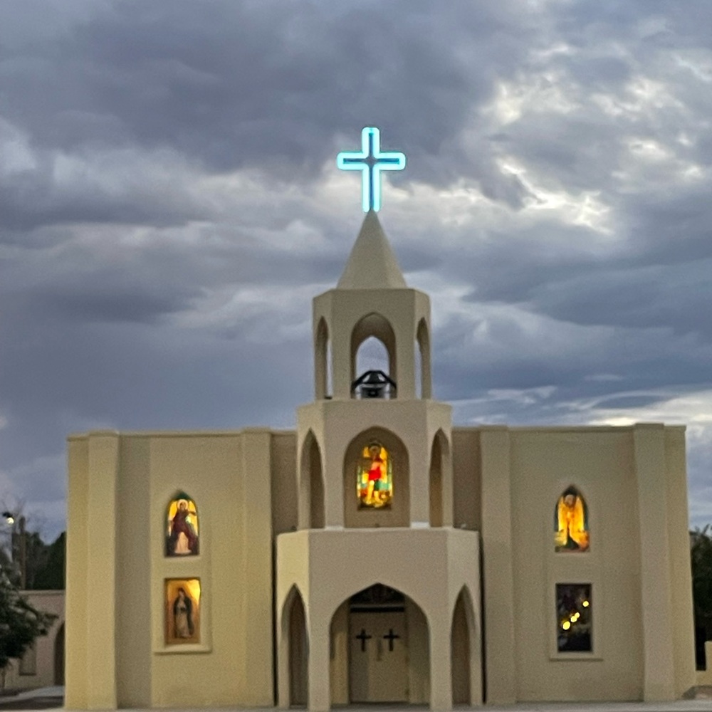 Church Building with Illuminated Cross